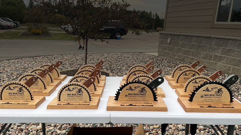 table displaying the trophies for the Big Bull Falls Grand Fondo cycling event